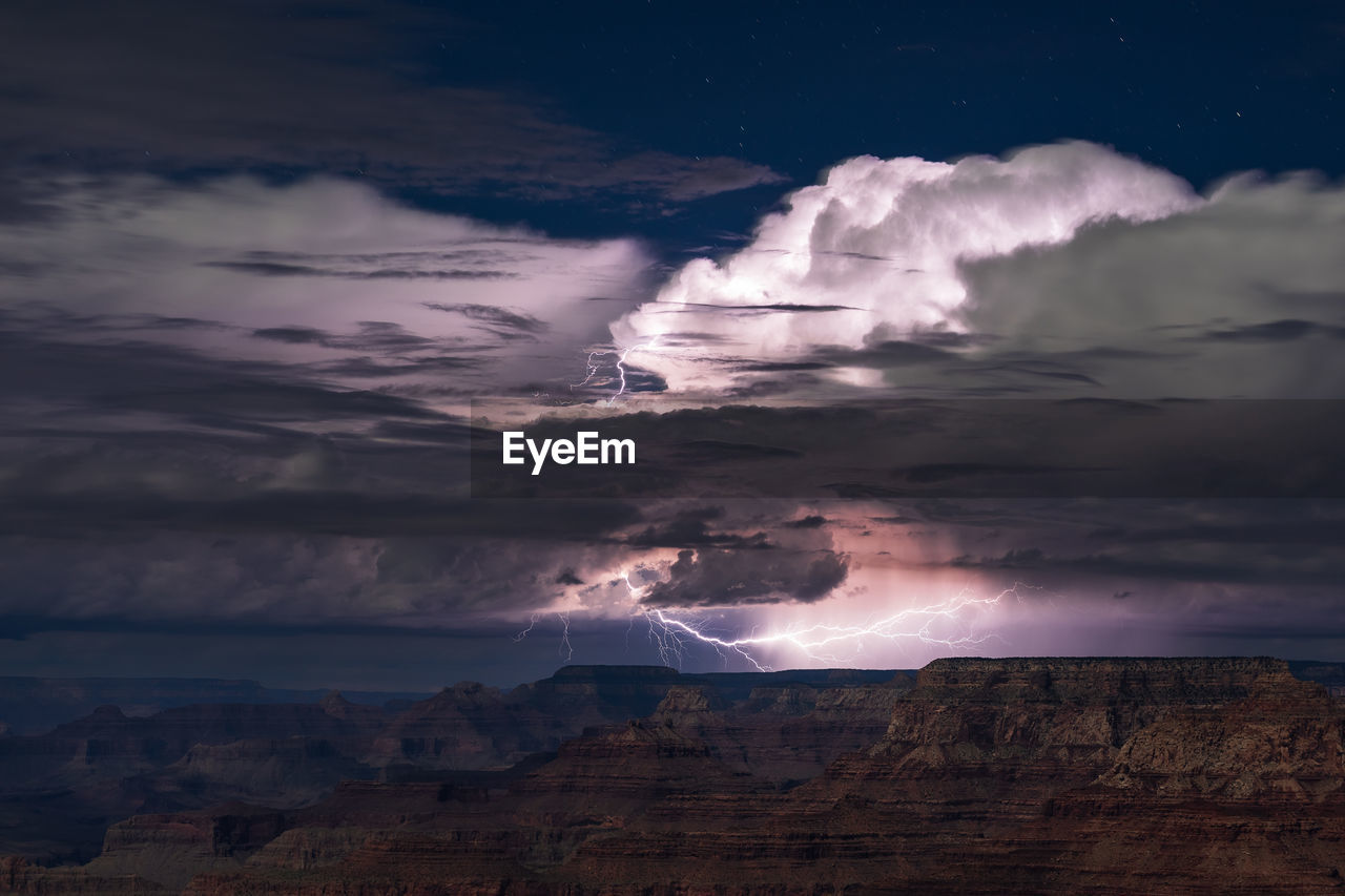 Lightning illuminates a summer thunderstorm over the grand canyon
