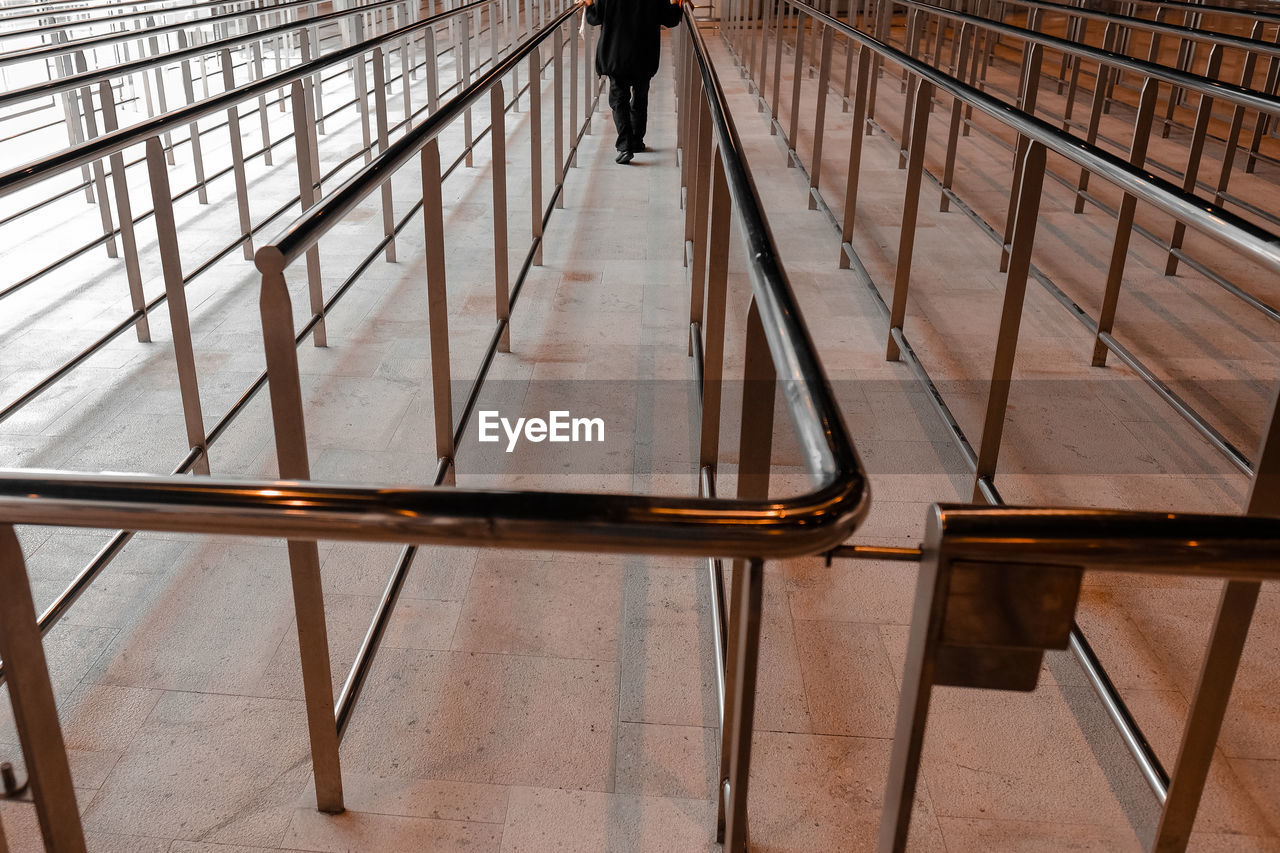 View of steel railing to empty visitors counter