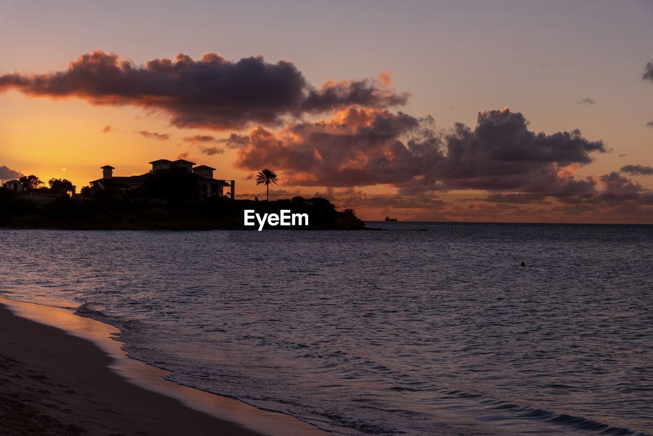 scenic view of sea against sky at sunset