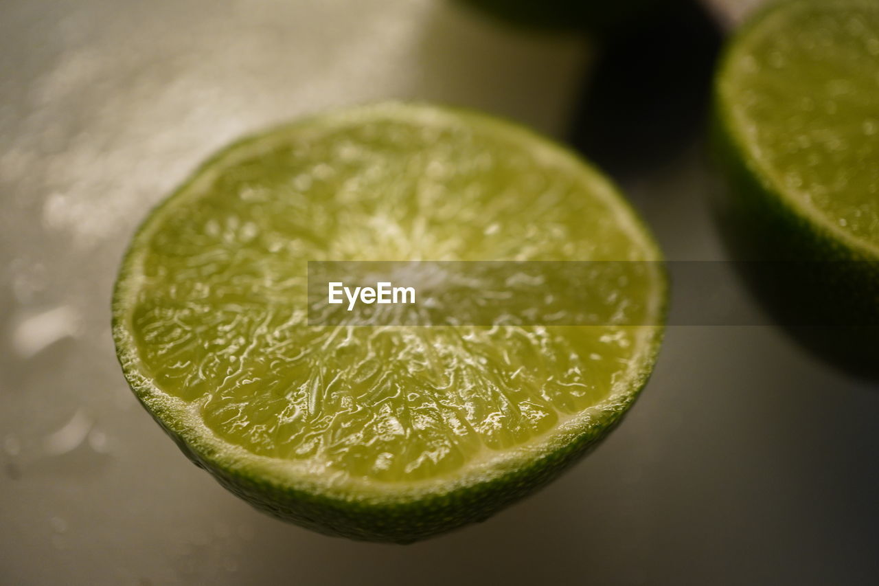 Close-up of lemon slice on table