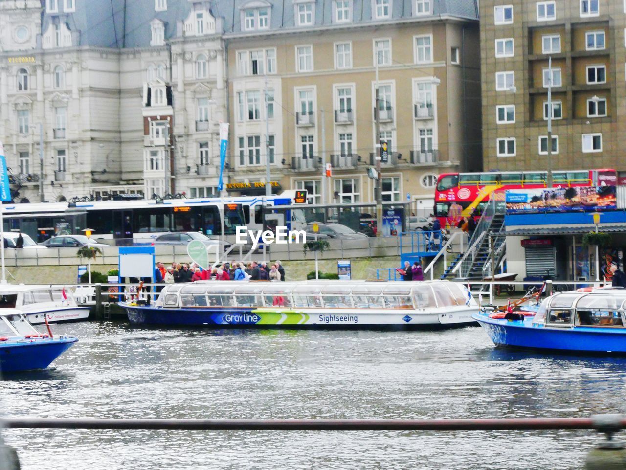 VIEW OF BOATS IN RIVER