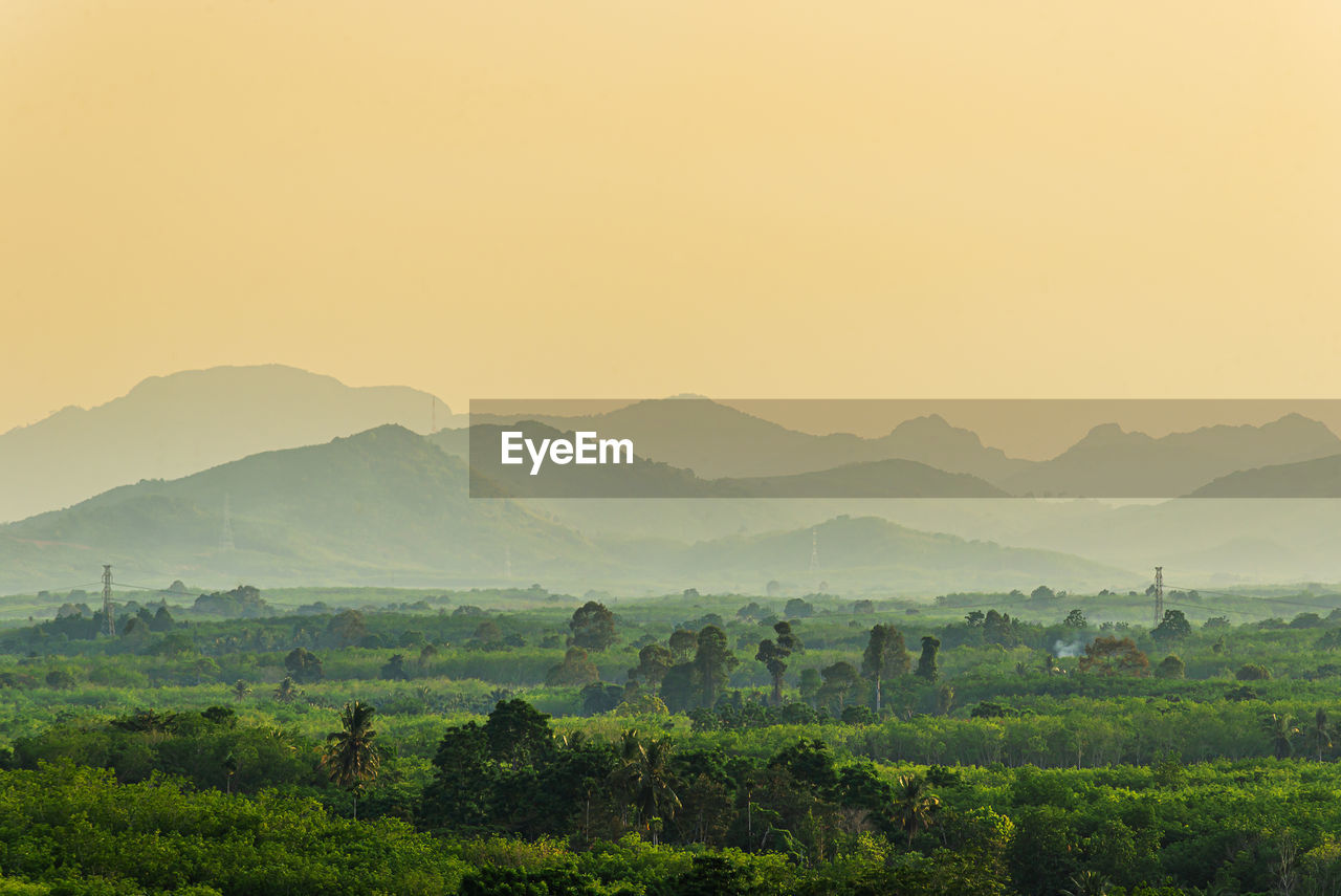 View of colorful dramatic sky sunset or sunrise with clouds background on mountain