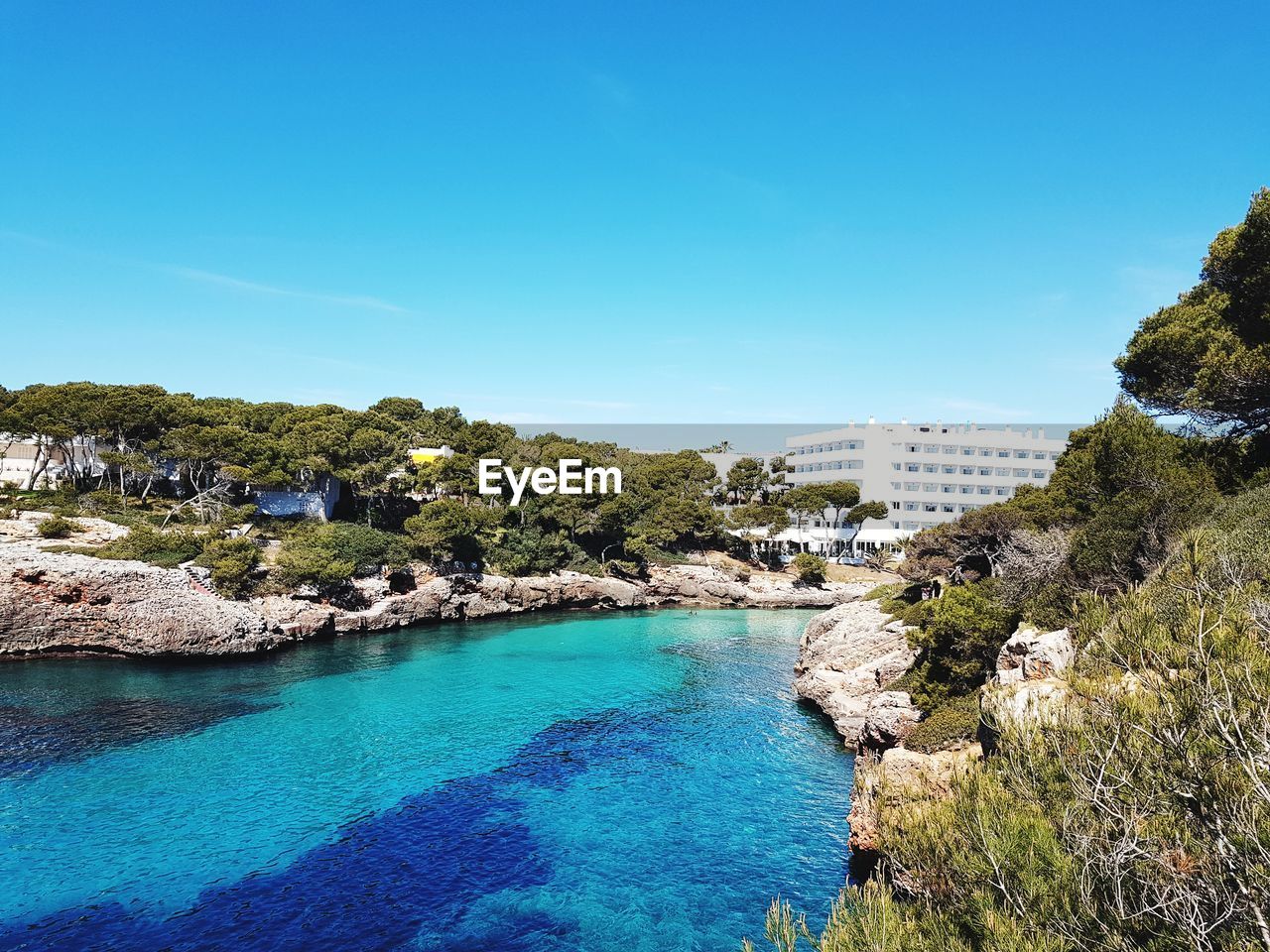 Scenic view of sea and hotel against sky, cala d'or 