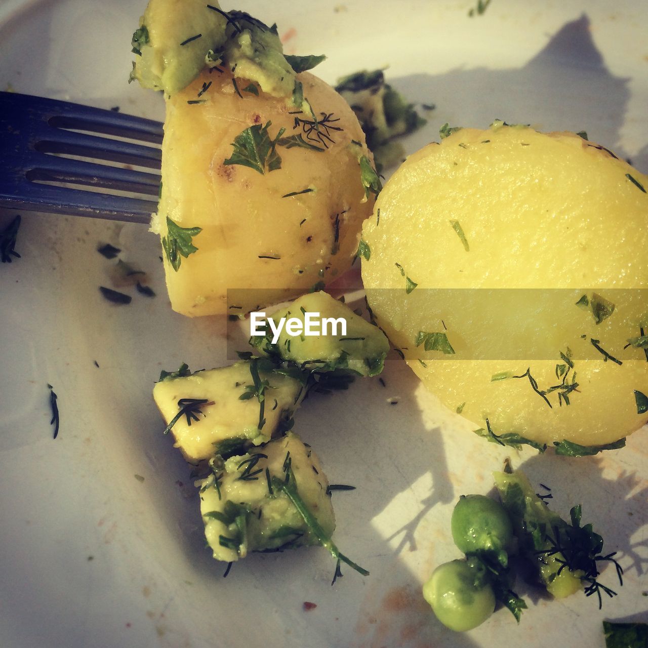 Close-up of boiled potato in plate