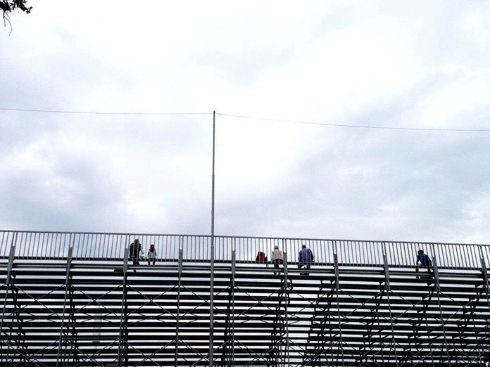 LOW ANGLE VIEW OF RAILING AGAINST CLOUDY SKY