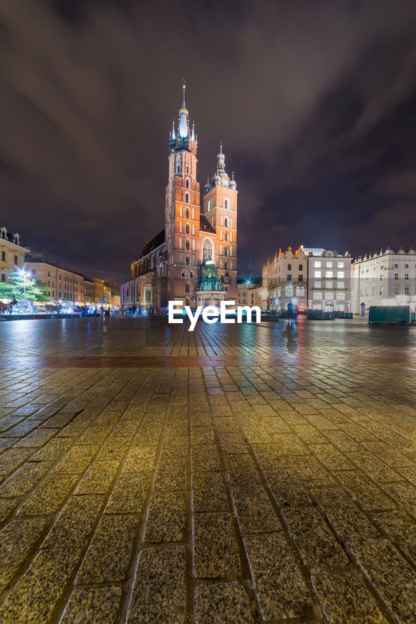 Illuminated buildings in city at night