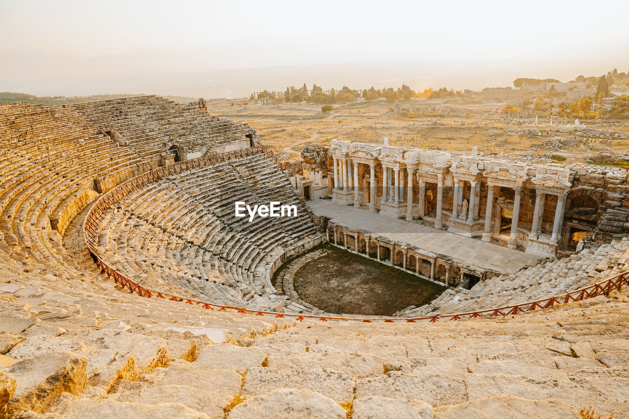 Roman amphitheater in the ruins of hierapolis, in pamukkale, turkey. unesco world heritage in turkey