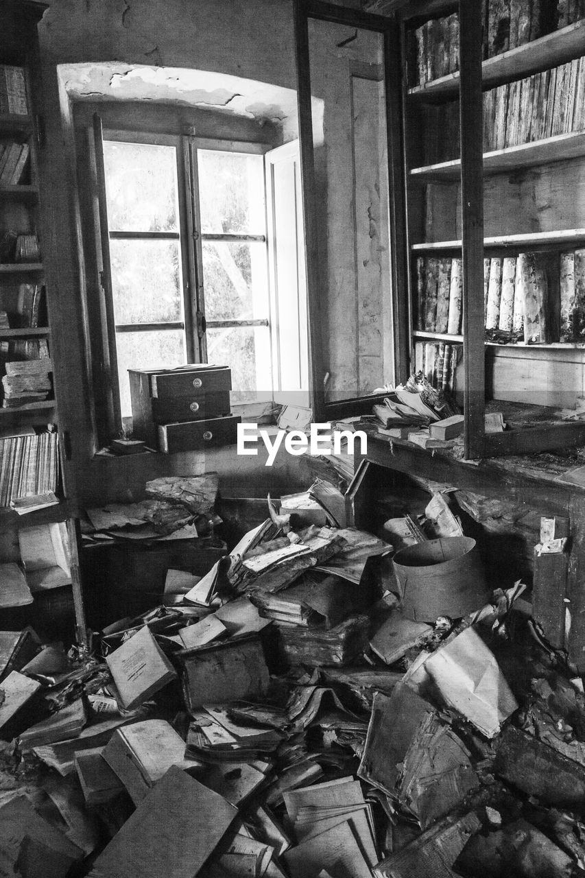 abandoned, indoors, damaged, window, no people, rundown, black and white, day, house, monochrome, large group of objects, architecture, old, monochrome photography, decline, building, messy, deterioration, bad condition, broken, built structure, domestic room, black, home interior, ruined, shelf, garbage, history