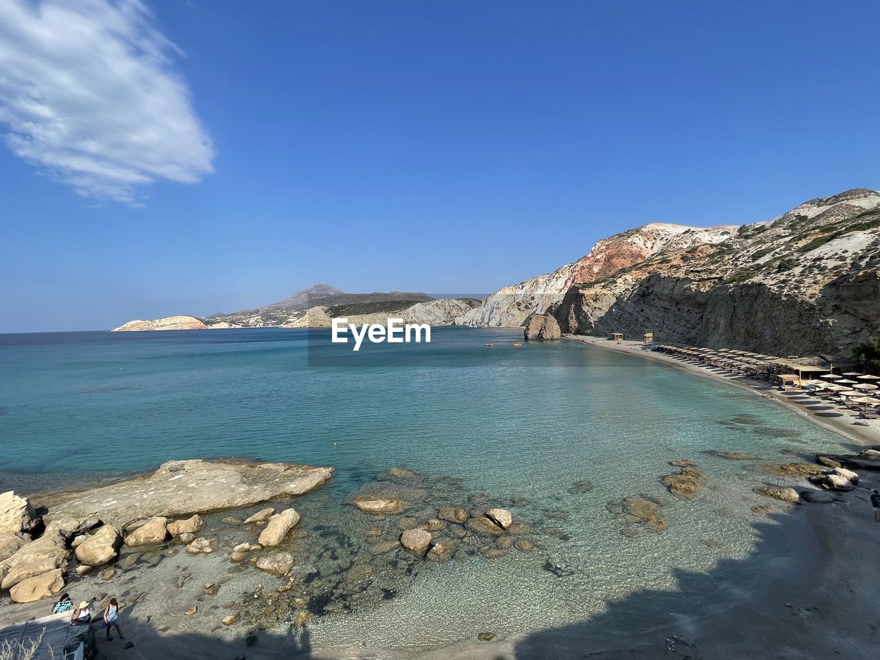 water, sky, sea, land, scenics - nature, body of water, beauty in nature, nature, coast, beach, shore, travel destinations, ocean, blue, vacation, mountain, travel, environment, rock, bay, landscape, tranquility, tranquil scene, tourism, clear sky, coastline, day, no people, terrain, outdoors, sunny, holiday, trip, cliff, lagoon, cloud, cove, idyllic, non-urban scene, island, sunlight, sand, mountain range