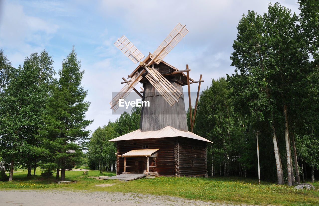 low angle view of built structure against trees