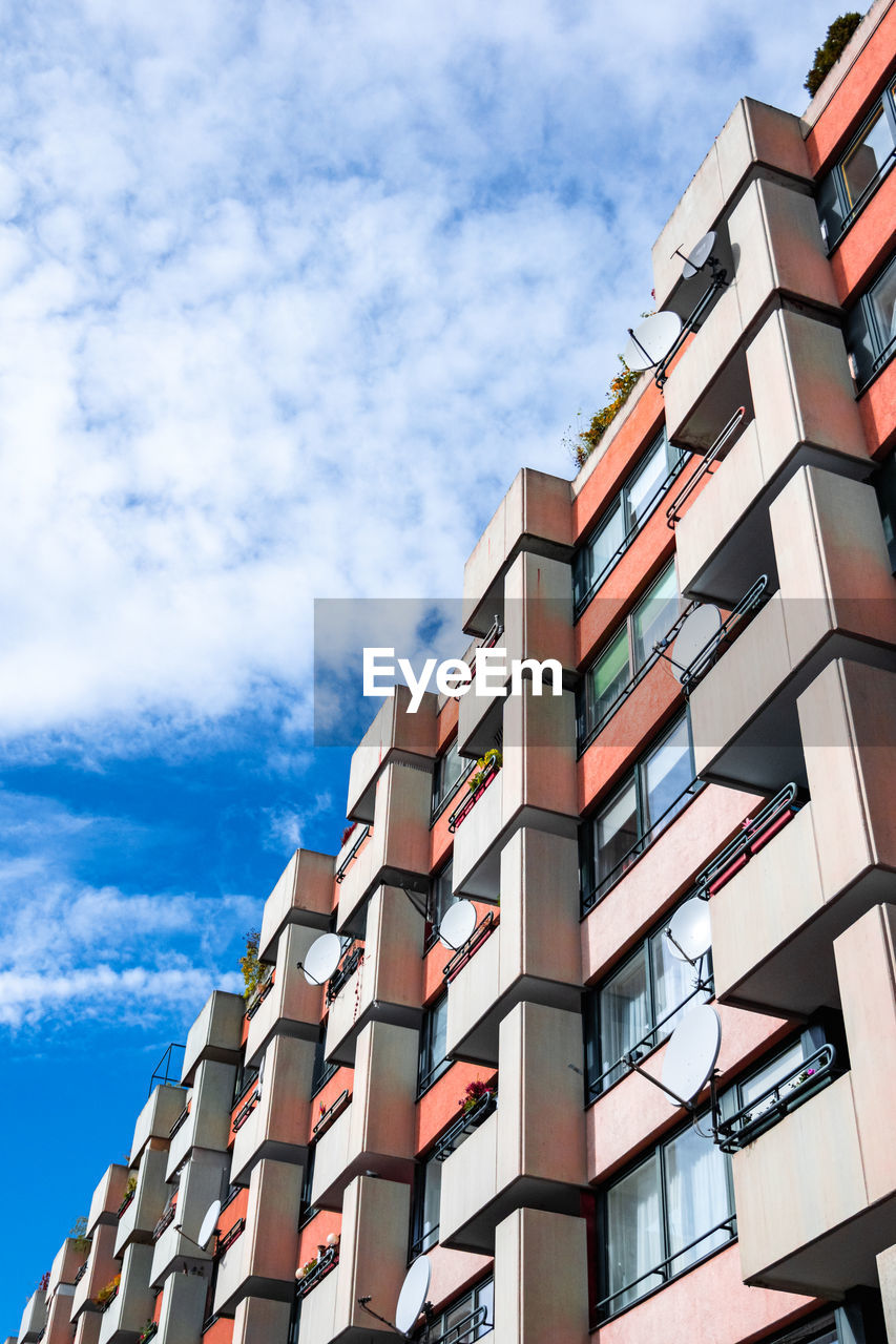 Low angle view of residential building against sky