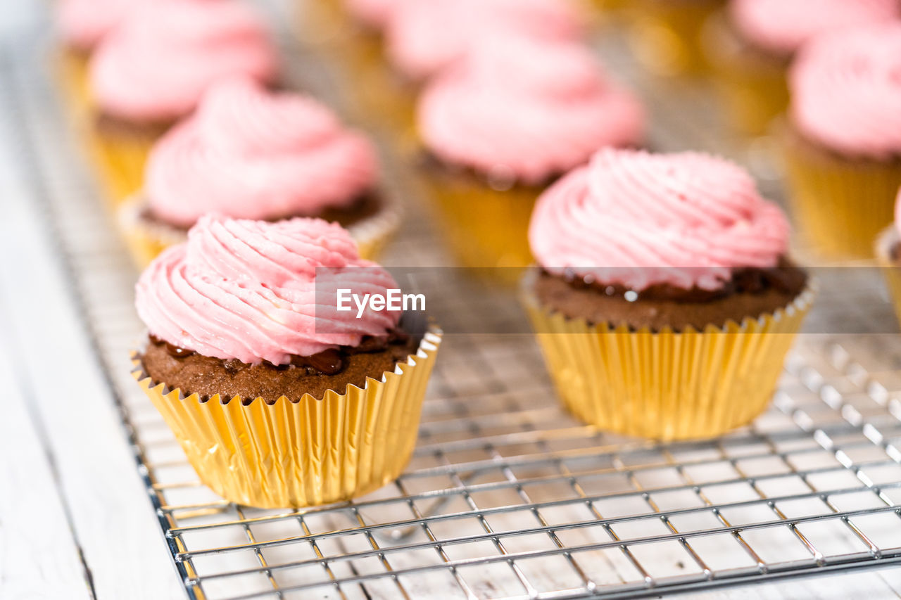 close-up of cupcakes on wooden table