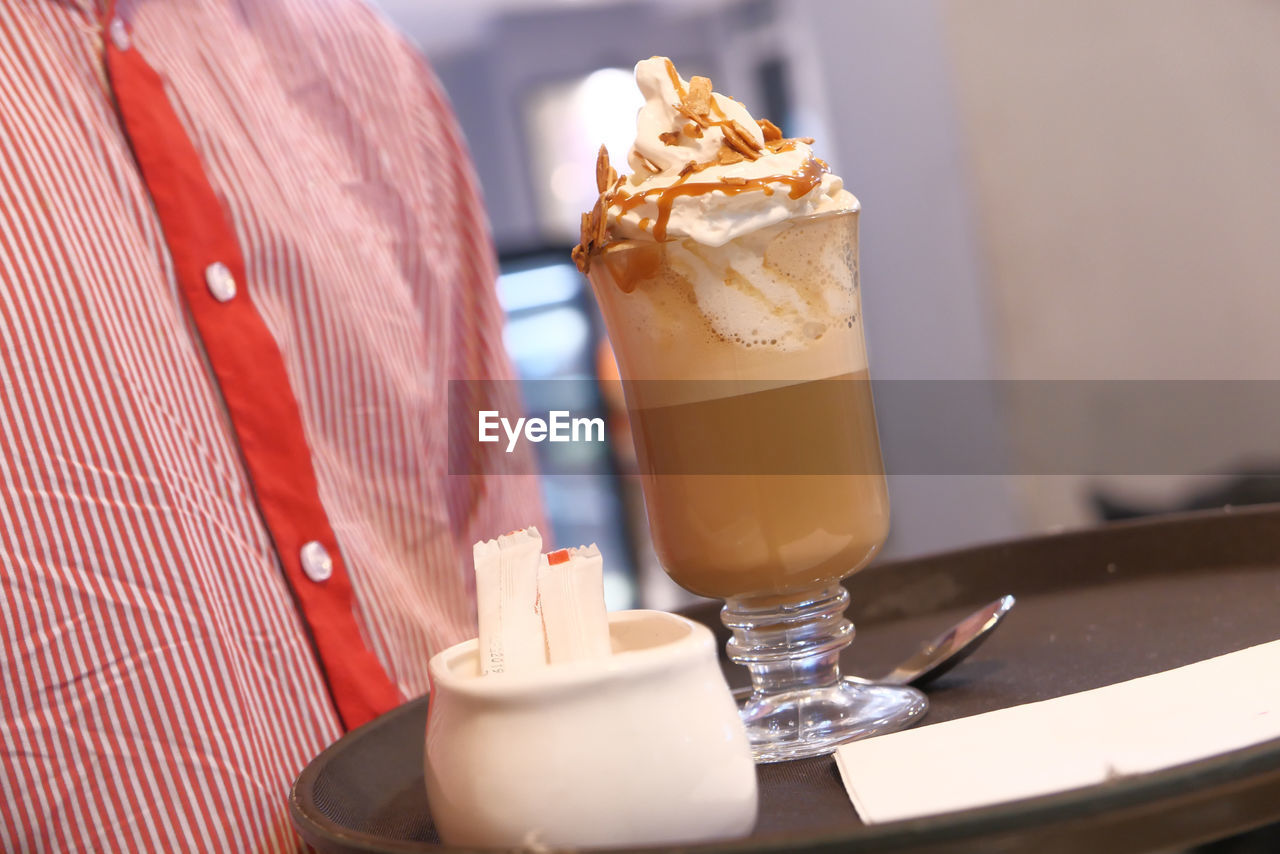 Man serving coffee