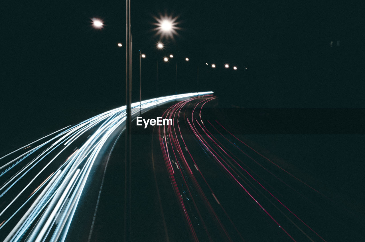 Light trails on road at night