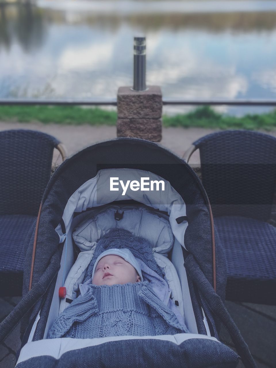 Baby boy sleeping in stroller