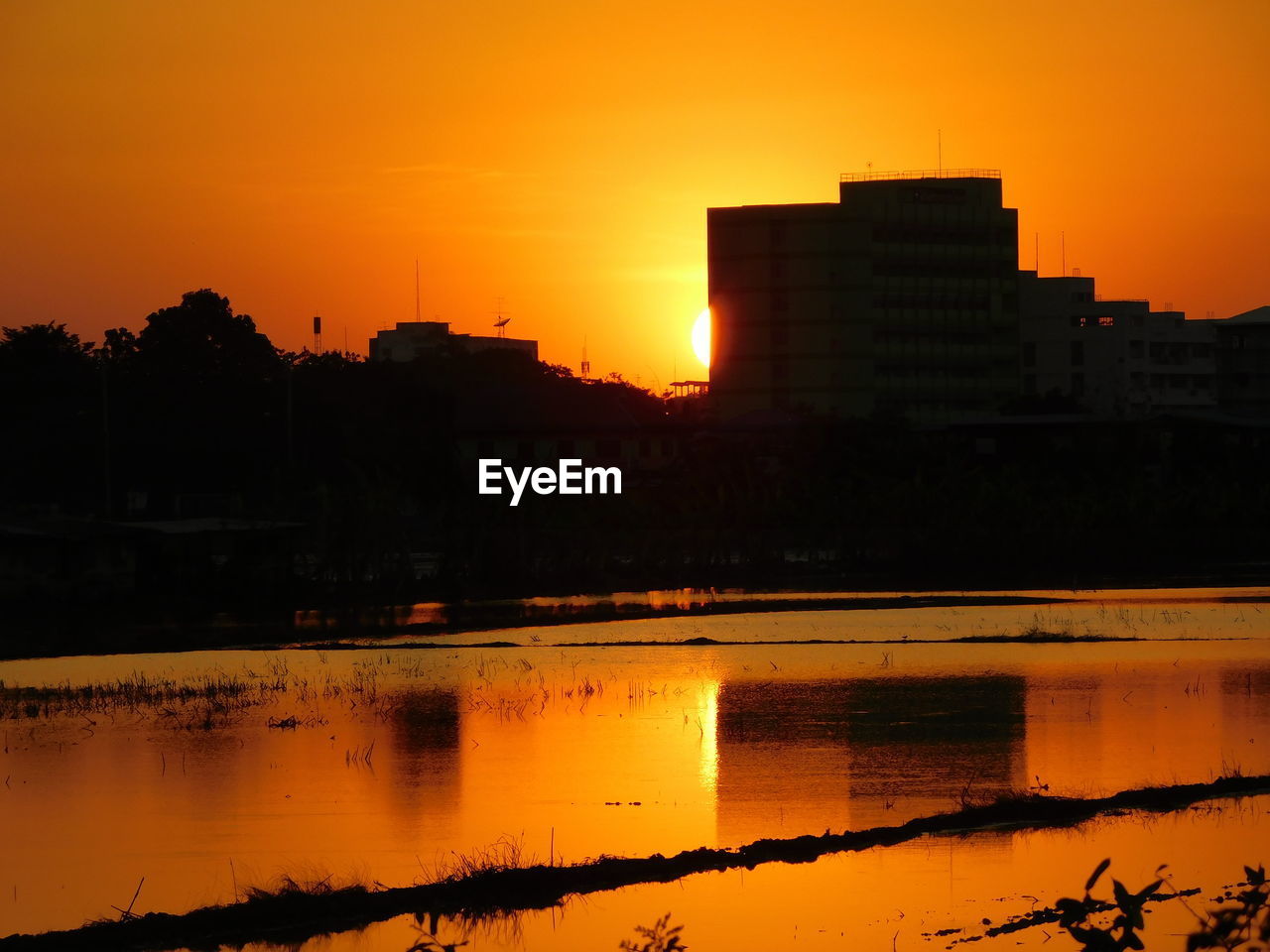 SILHOUETTE OF BUILDINGS DURING SUNSET