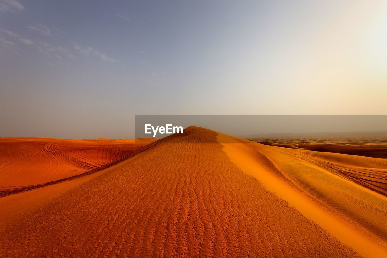 Scenic view of desert against sky