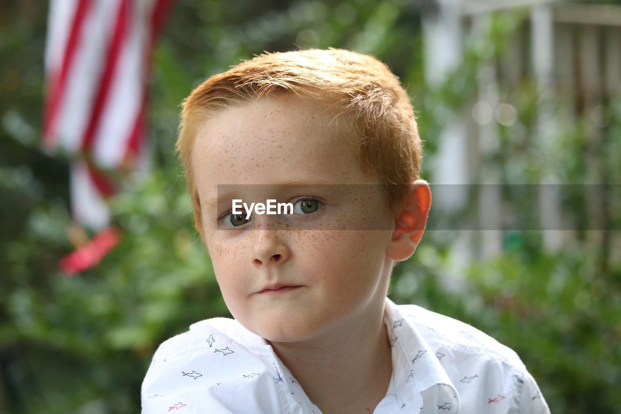 PORTRAIT OF BOY LOOKING AT CAMERA