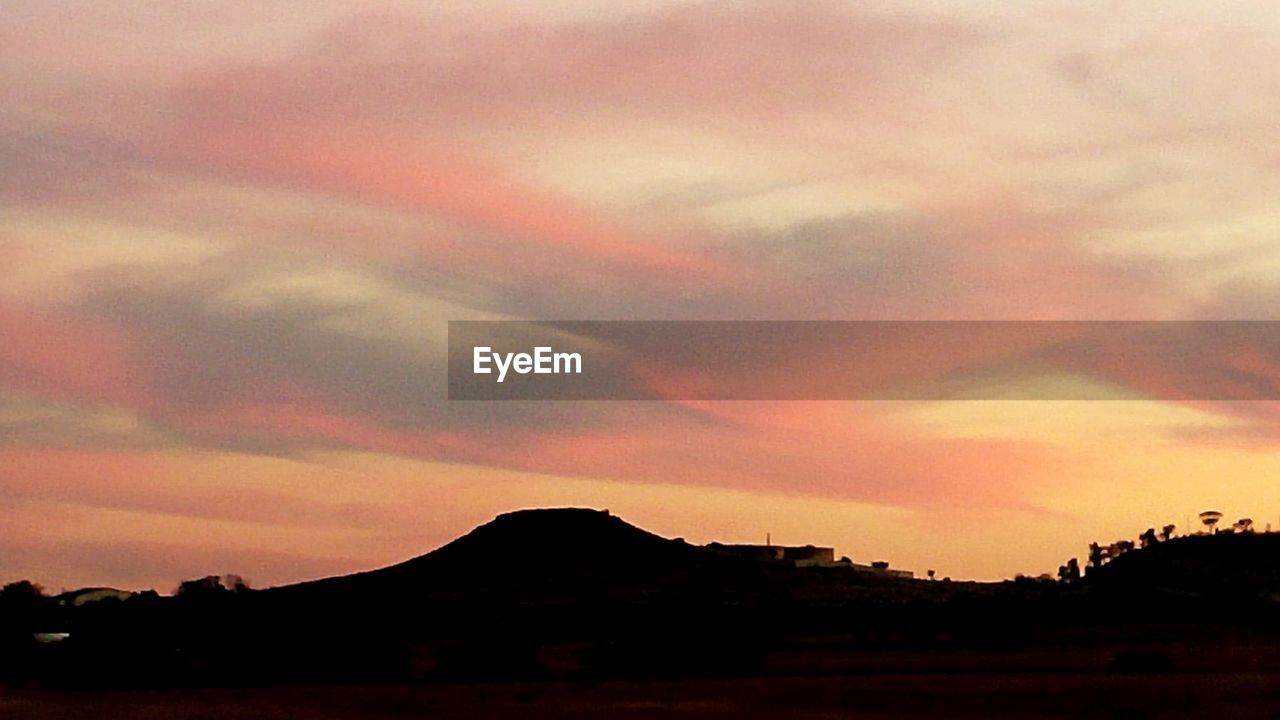 SUNSET OVER MOUNTAINS