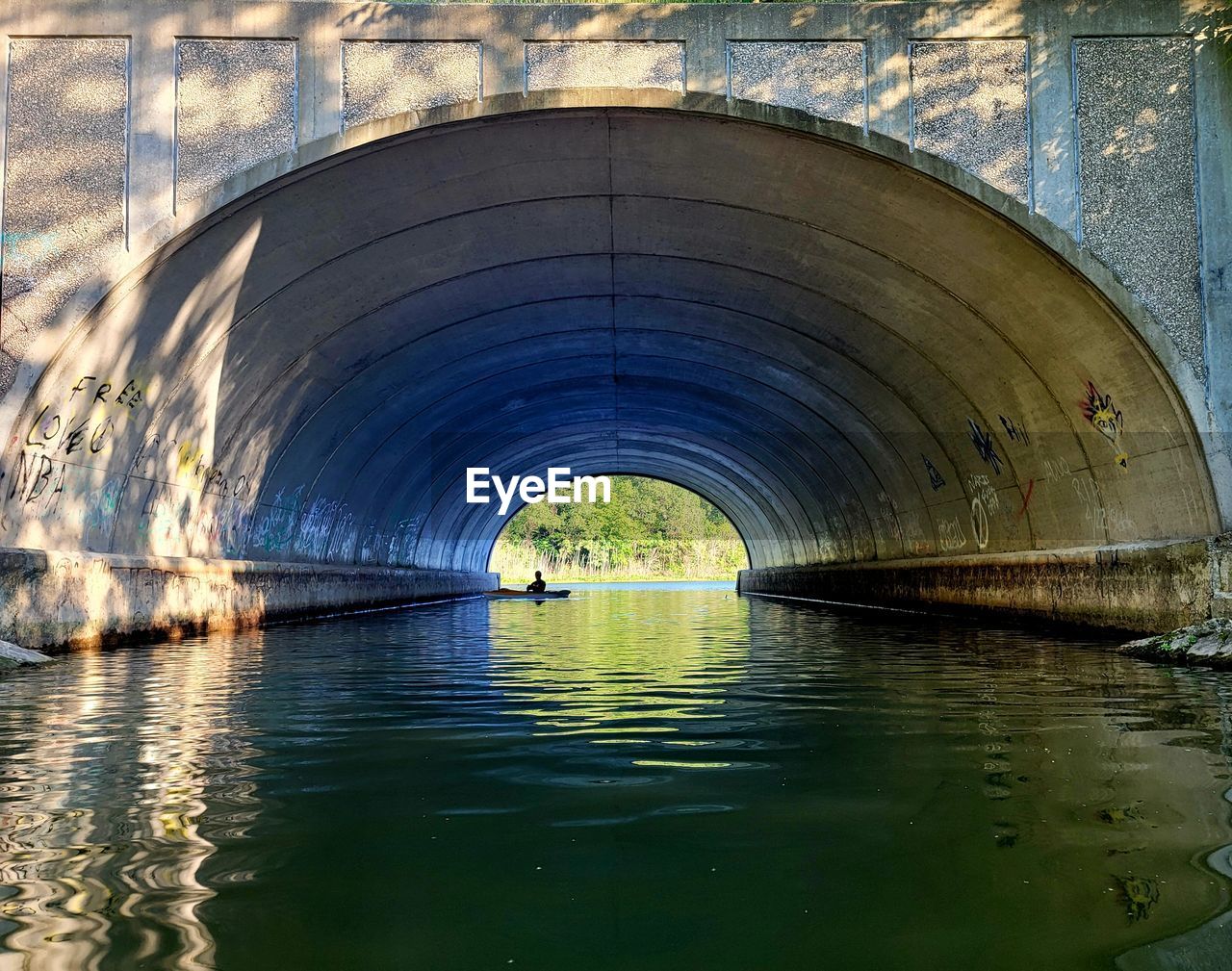 water, reflection, architecture, arch, built structure, tunnel, bridge, no people, infrastructure, nature, waterway, day, transportation, waterfront, outdoors, river