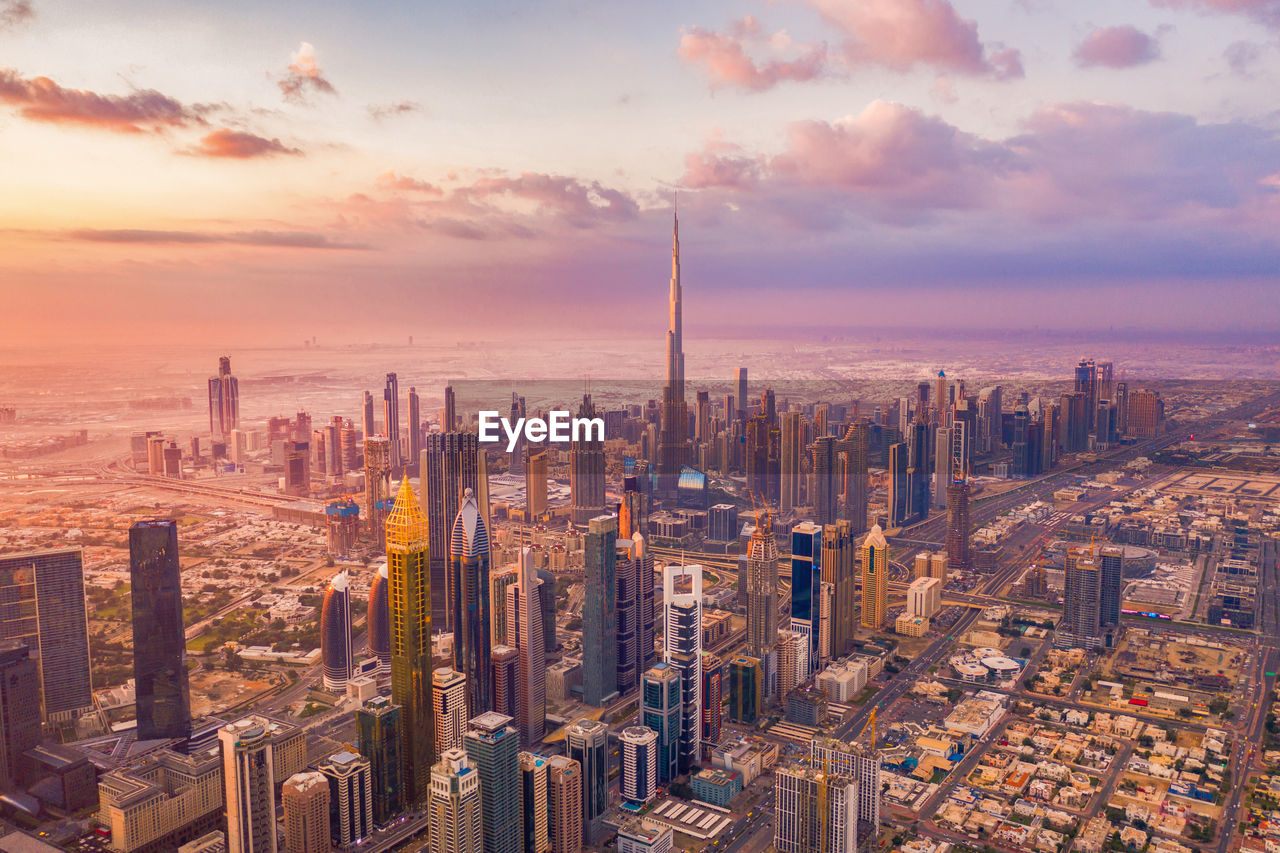 View of cityscape against sky during sunset