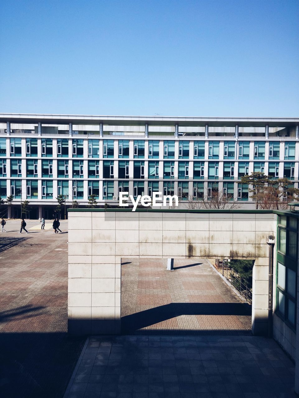 View of building campus against clear sky