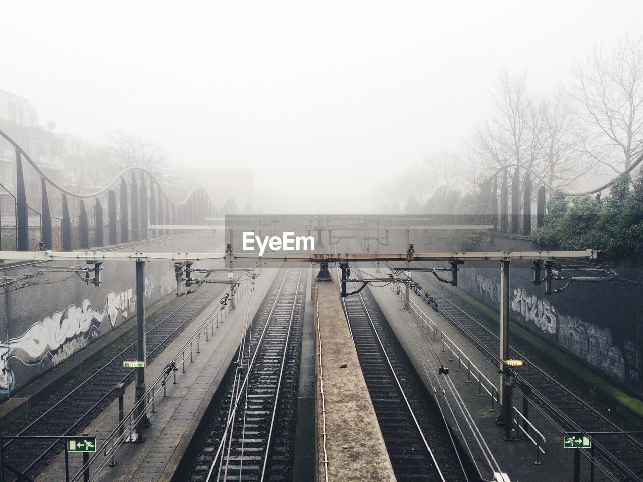 High angle view of railroad station platform in foggy weather