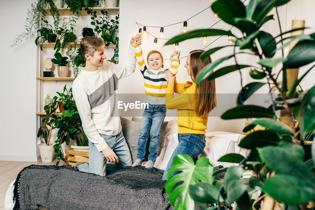 Cheerful family enjoying at home