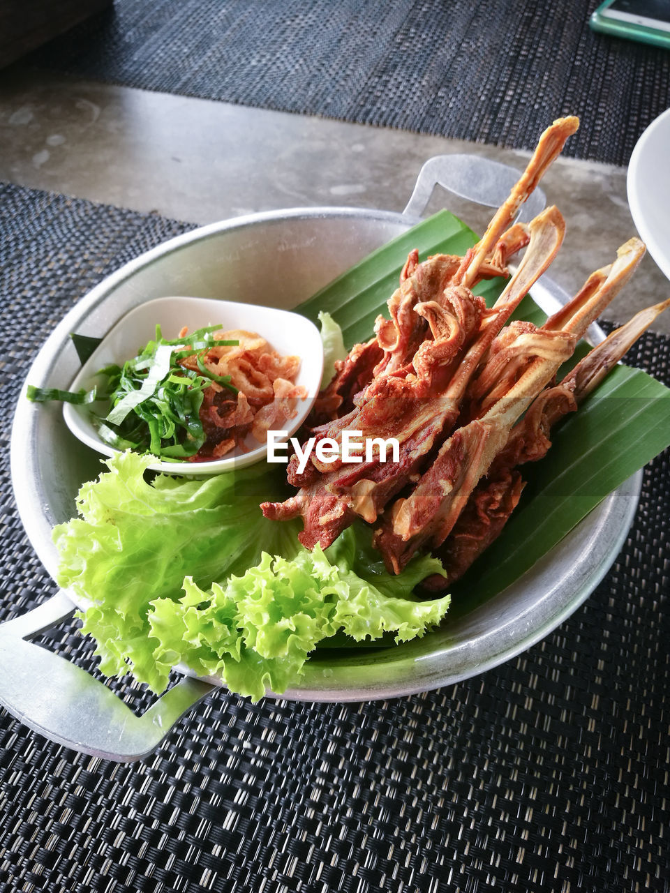 High angle view of fried meat served on table