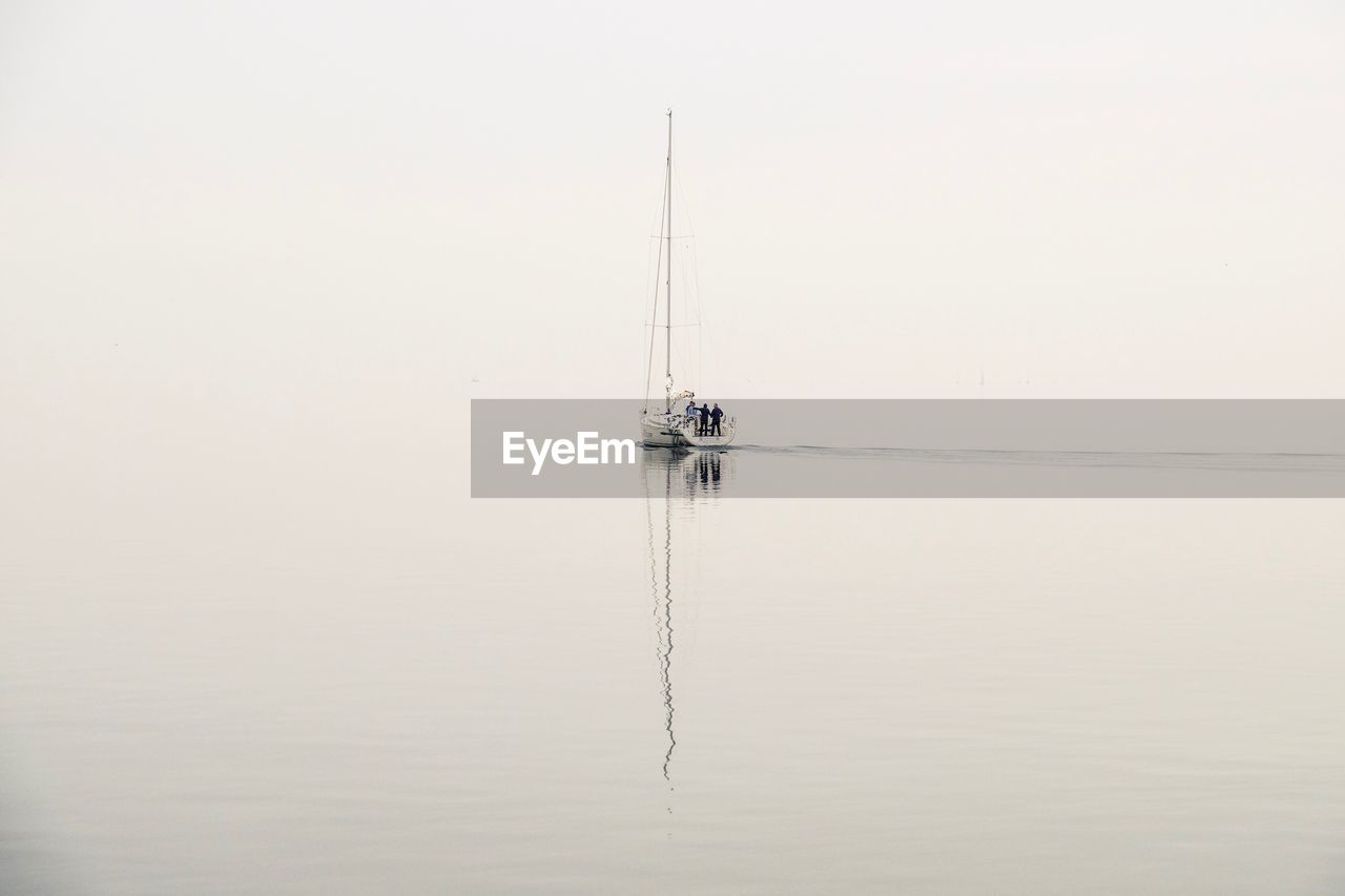 Ship in sea against sky