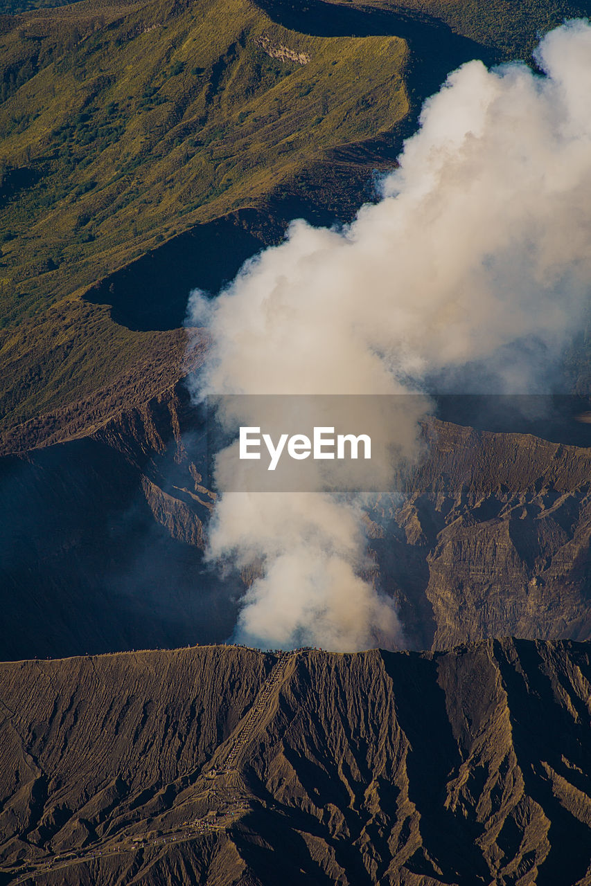 Aerial view of mountains against sky