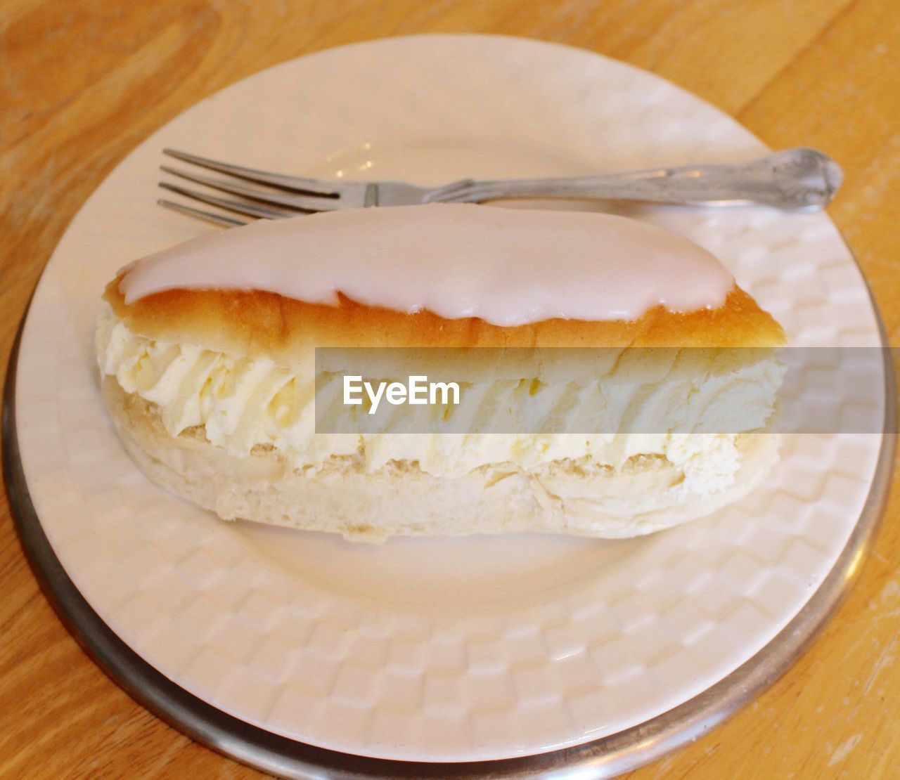 High angle view of cake in plate on table