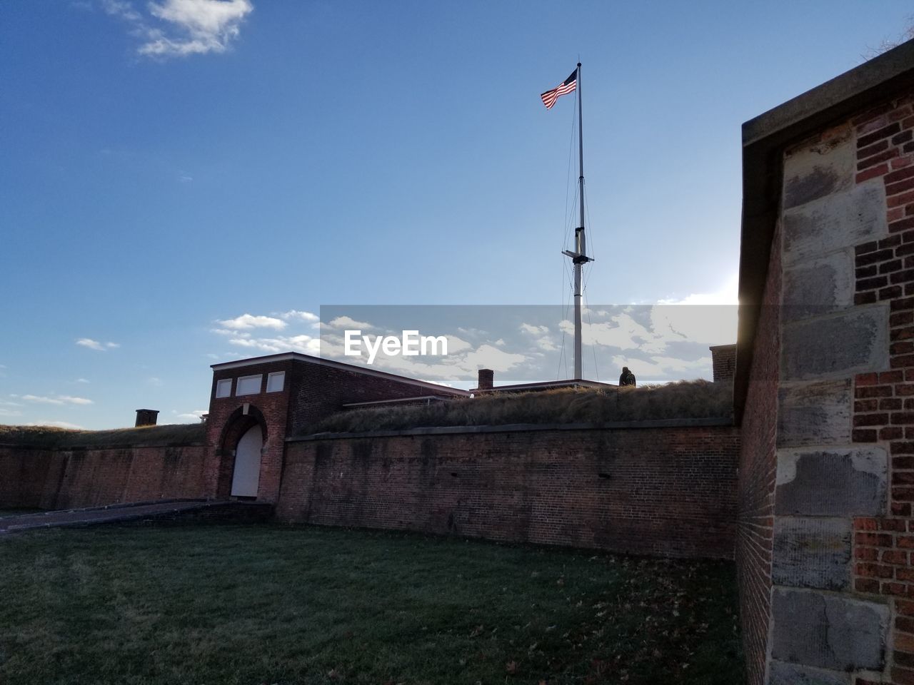 LOW ANGLE VIEW OF FLAG AT NIGHT