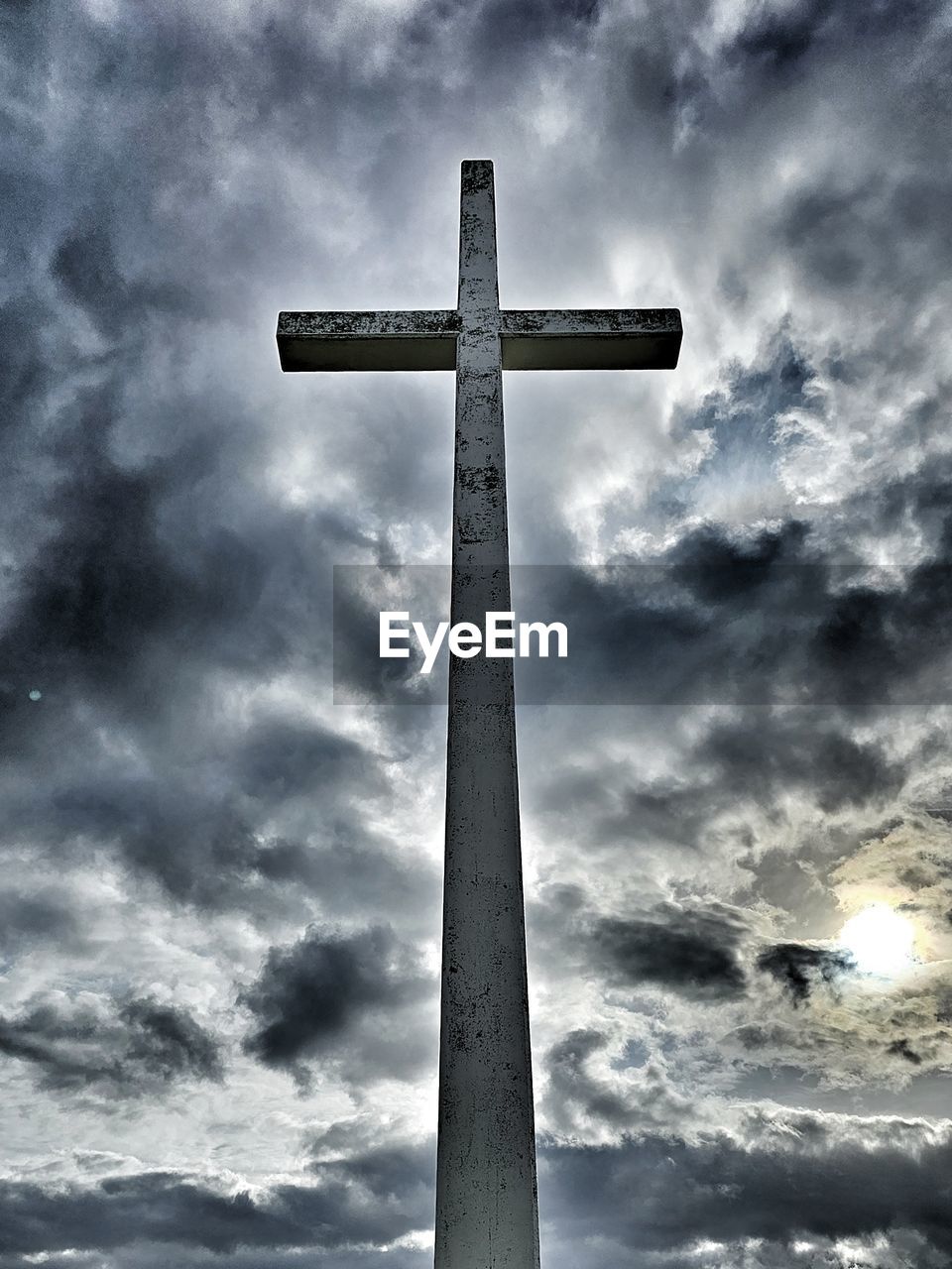 cross, sky, cloud, religion, belief, symbol, spirituality, catholicism, cross shape, low angle view, cloudscape, crucifix, nature, no people, dramatic sky, black and white, storm, outdoors, monochrome, place of worship, architecture, sadness, death, overcast, hope, cemetery, easter, forgiveness, emotion, day, grave