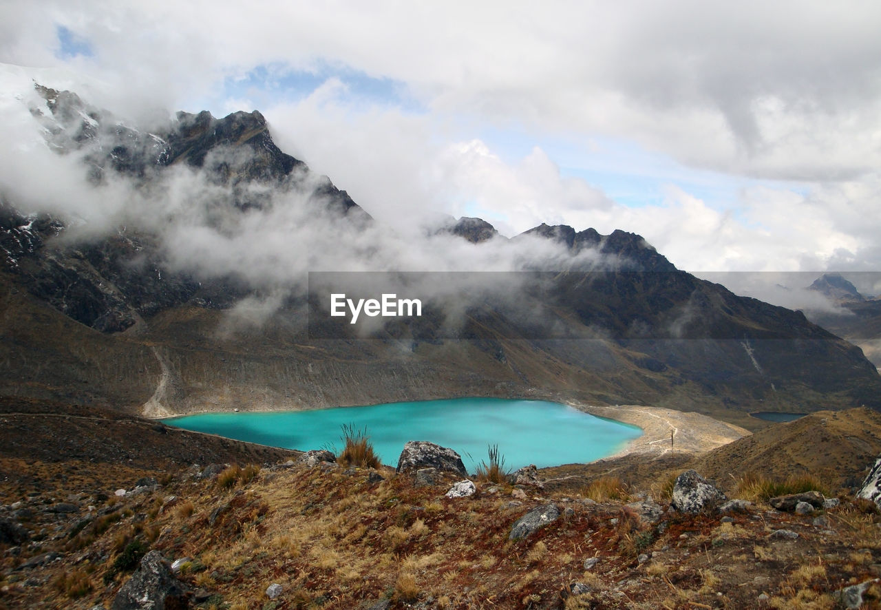 SCENIC VIEW OF MOUNTAIN AGAINST SKY