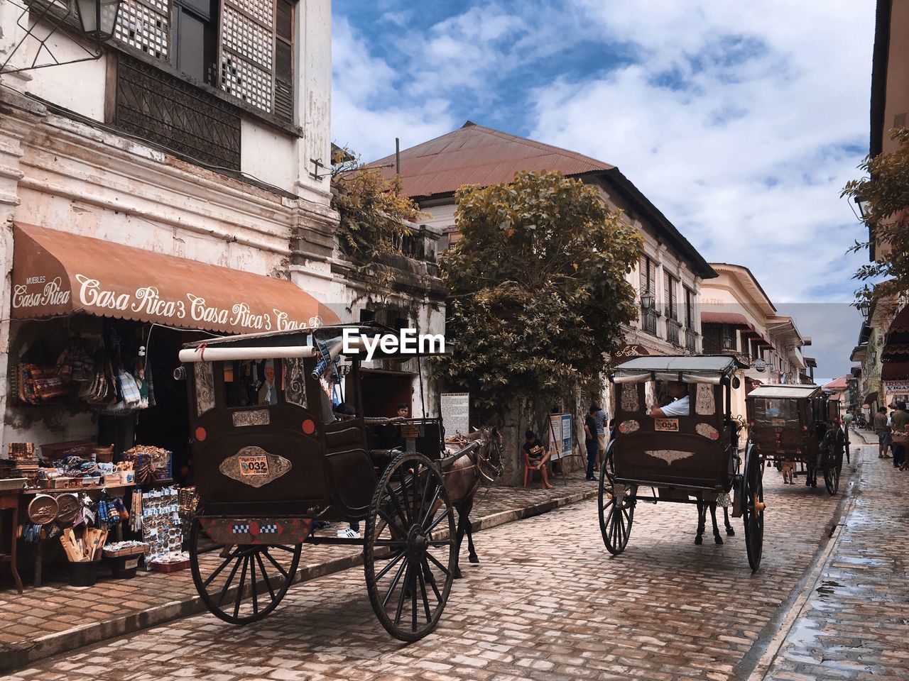 STREET AMIDST BUILDINGS IN CITY