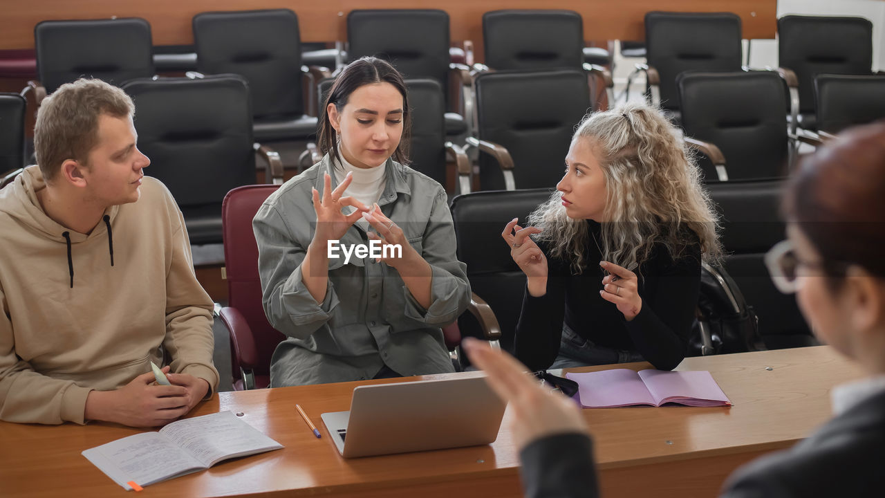 Group of people on table