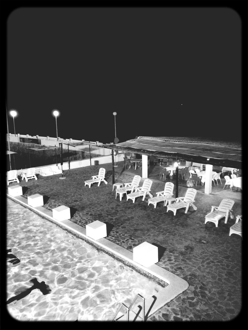 VIEW OF EMPTY CHAIRS AND TABLES