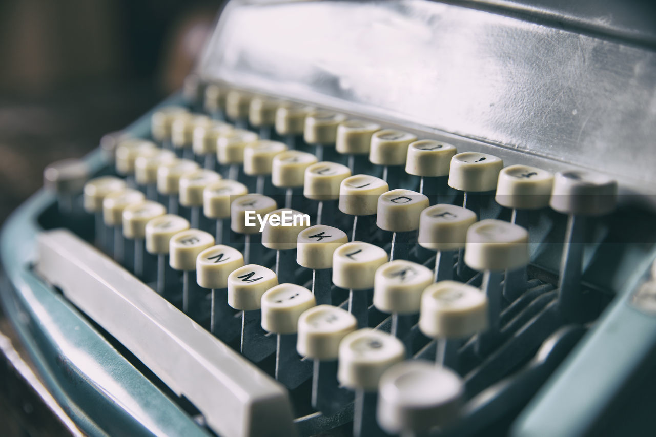 Close-up of typewriter on table