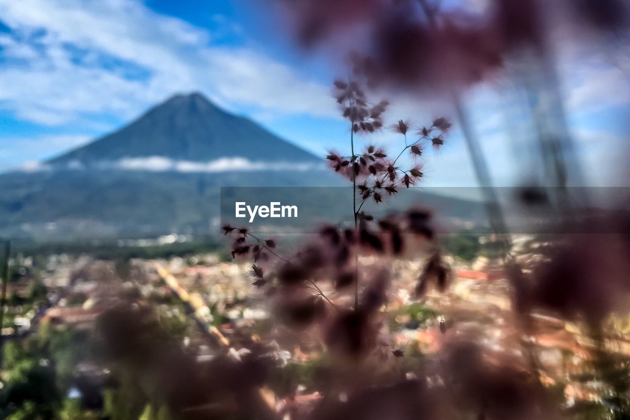 Defocused image of mountain against blue sky