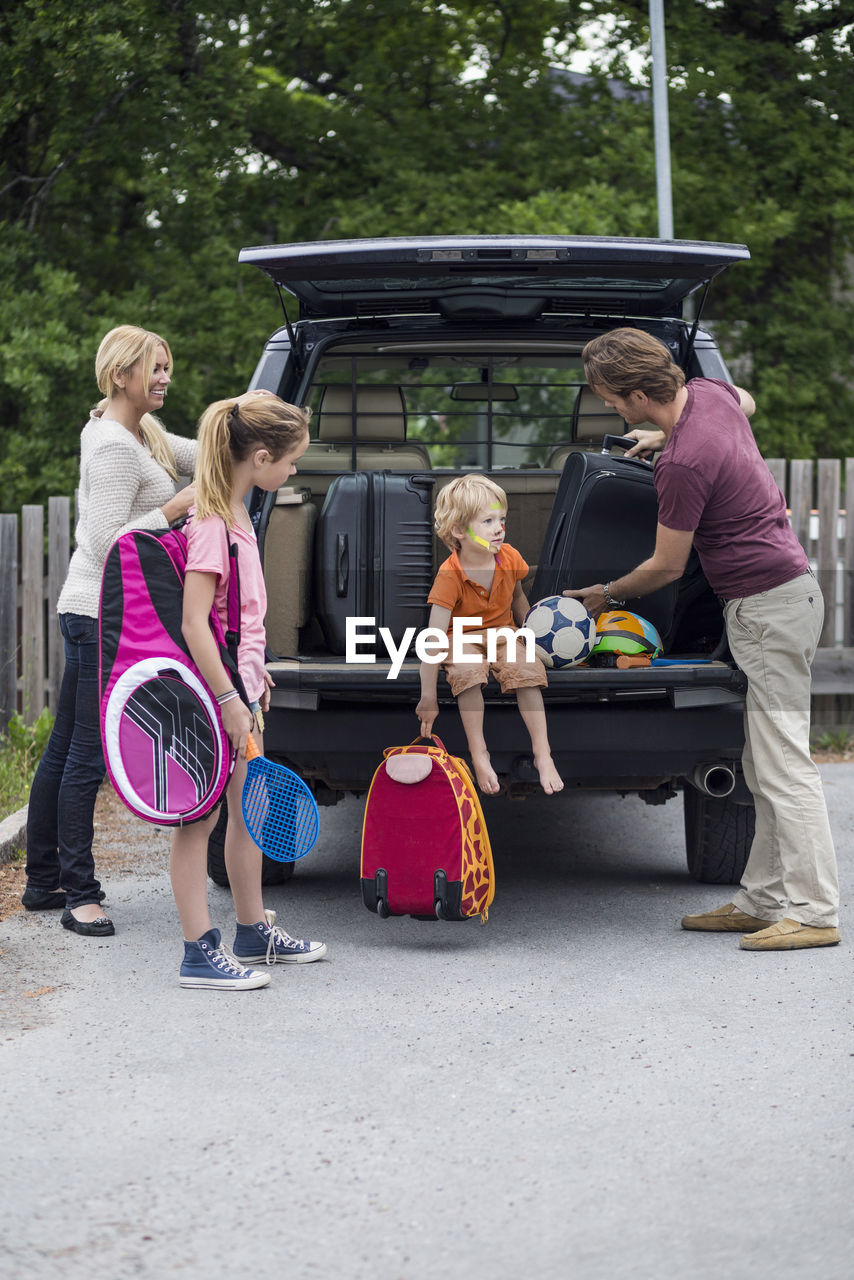 Family preparing for road trip