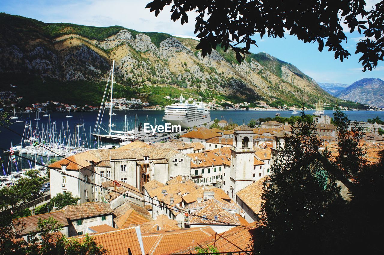 High angle view of townscape by sea