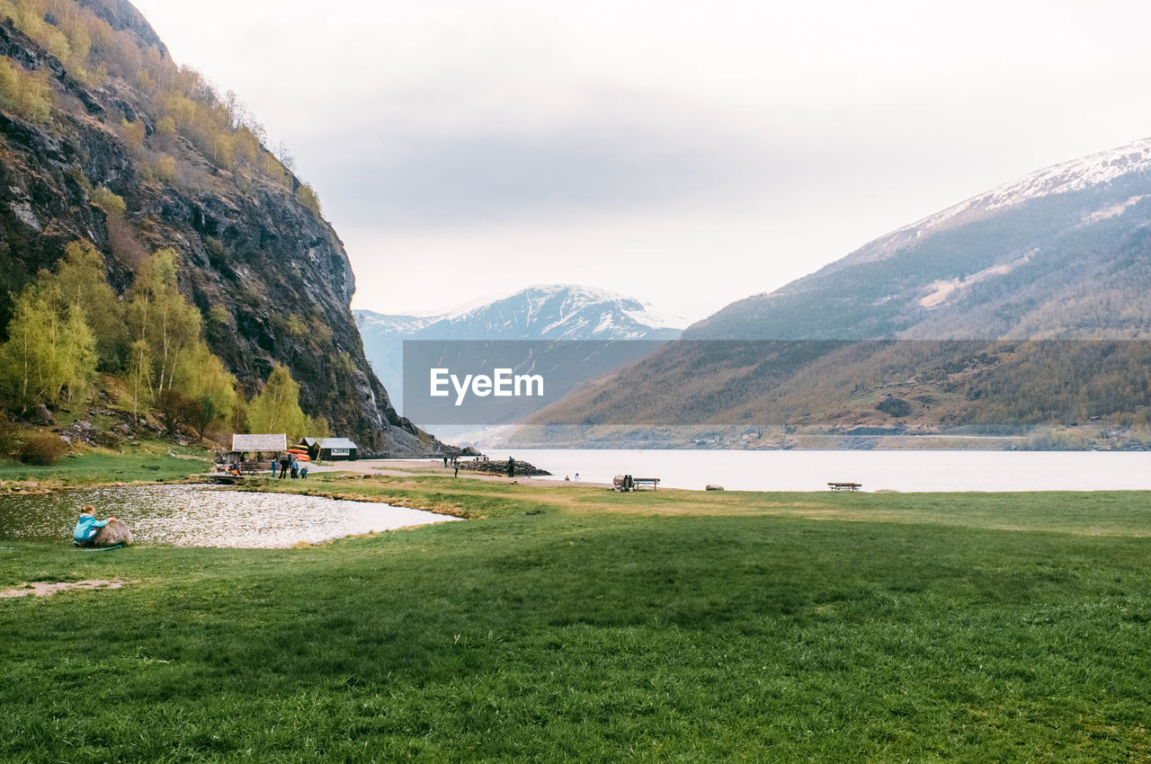 River with snowcapped mountains in background