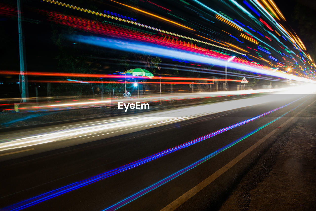 Light trails on road at night