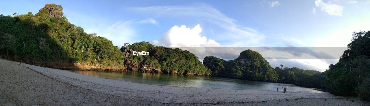 Panoramic view of beach against sky