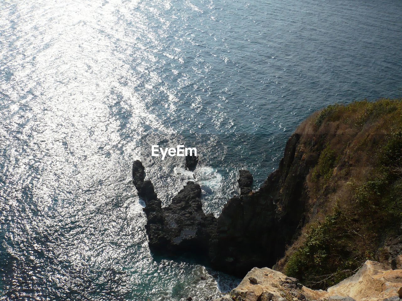 High angle view of rock at sea shore