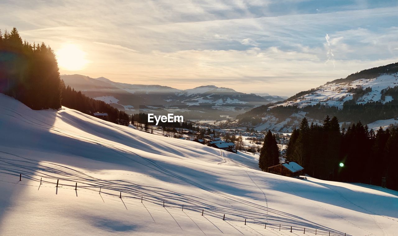 Scenic view of snow covered mountains against sky at austria wilder kaiser