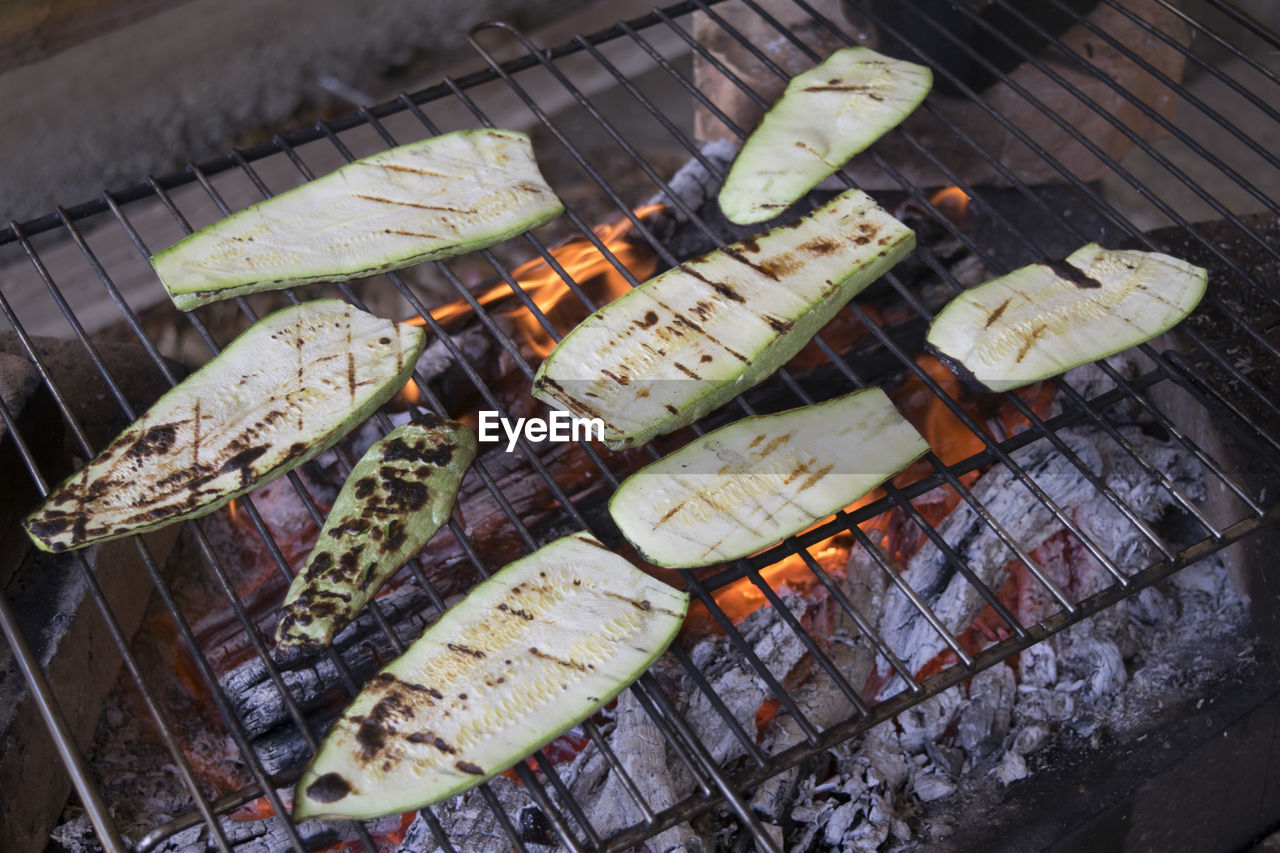 High angle view of zucchini on barbecue grill