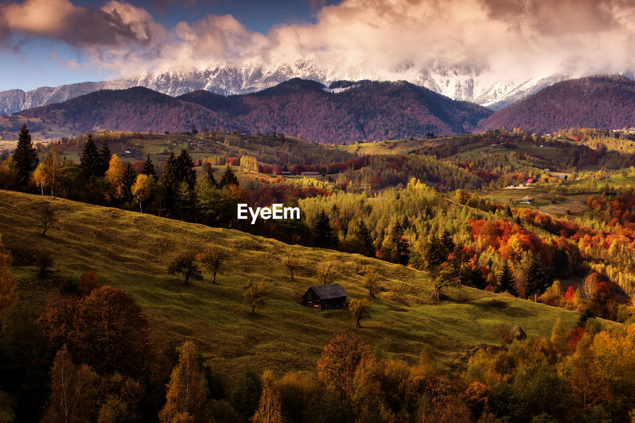 Scenic view of landscape against sky during autumn