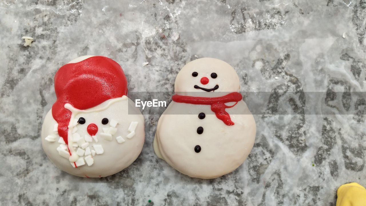 Directly above shot of cookies on marble